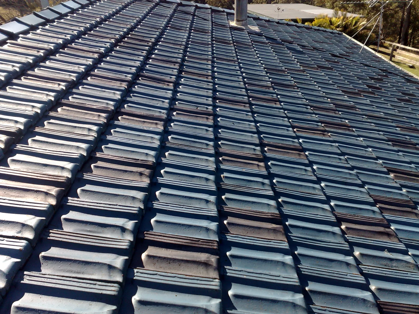 After — tiled roof before and after pressure cleaning