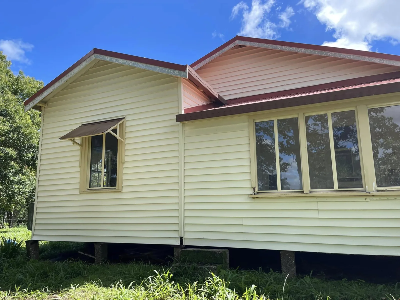 After — weatherboard home exterior before and after house washing